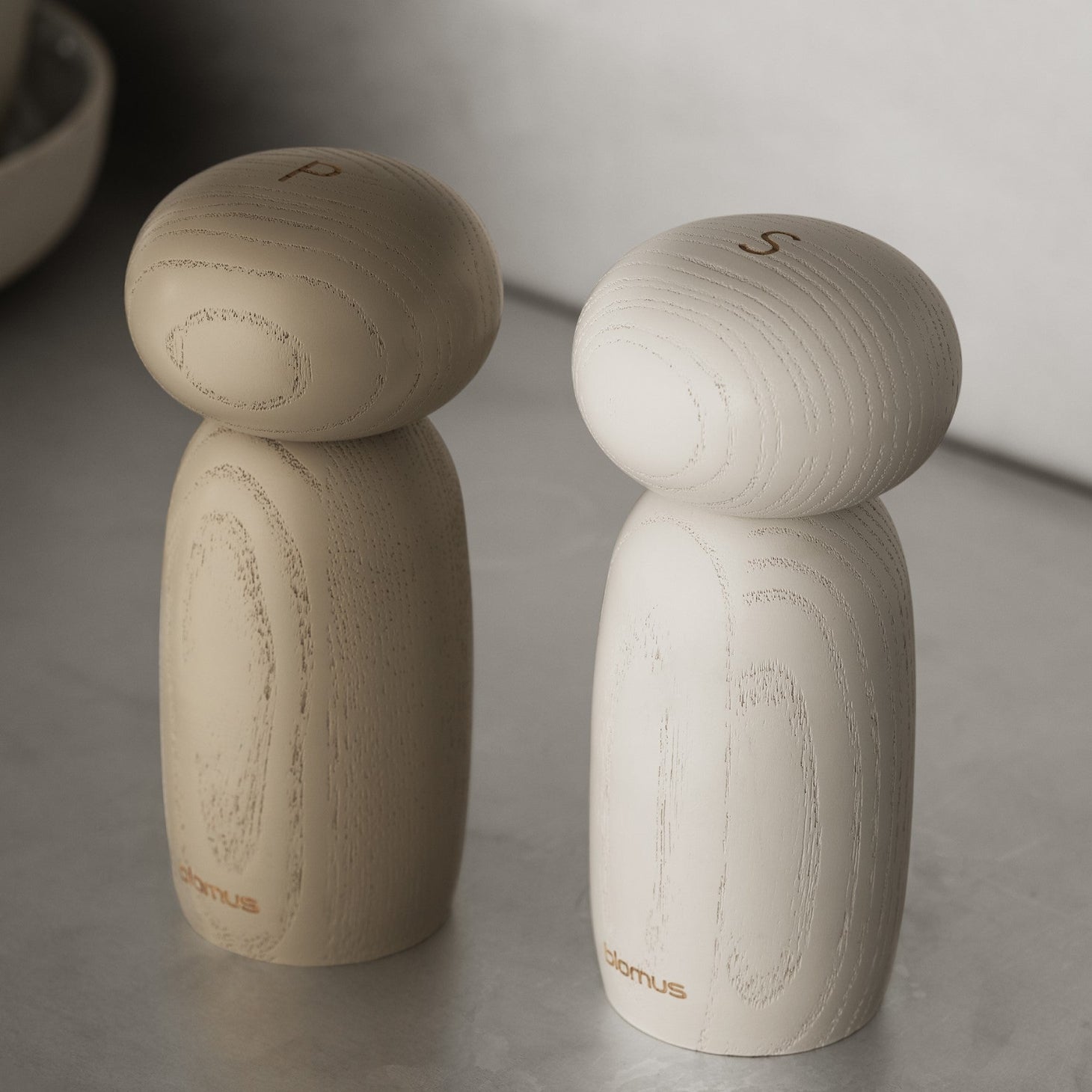 closeup detailing the Ash wood grain of MOLI salt and pepper grinders by blomus