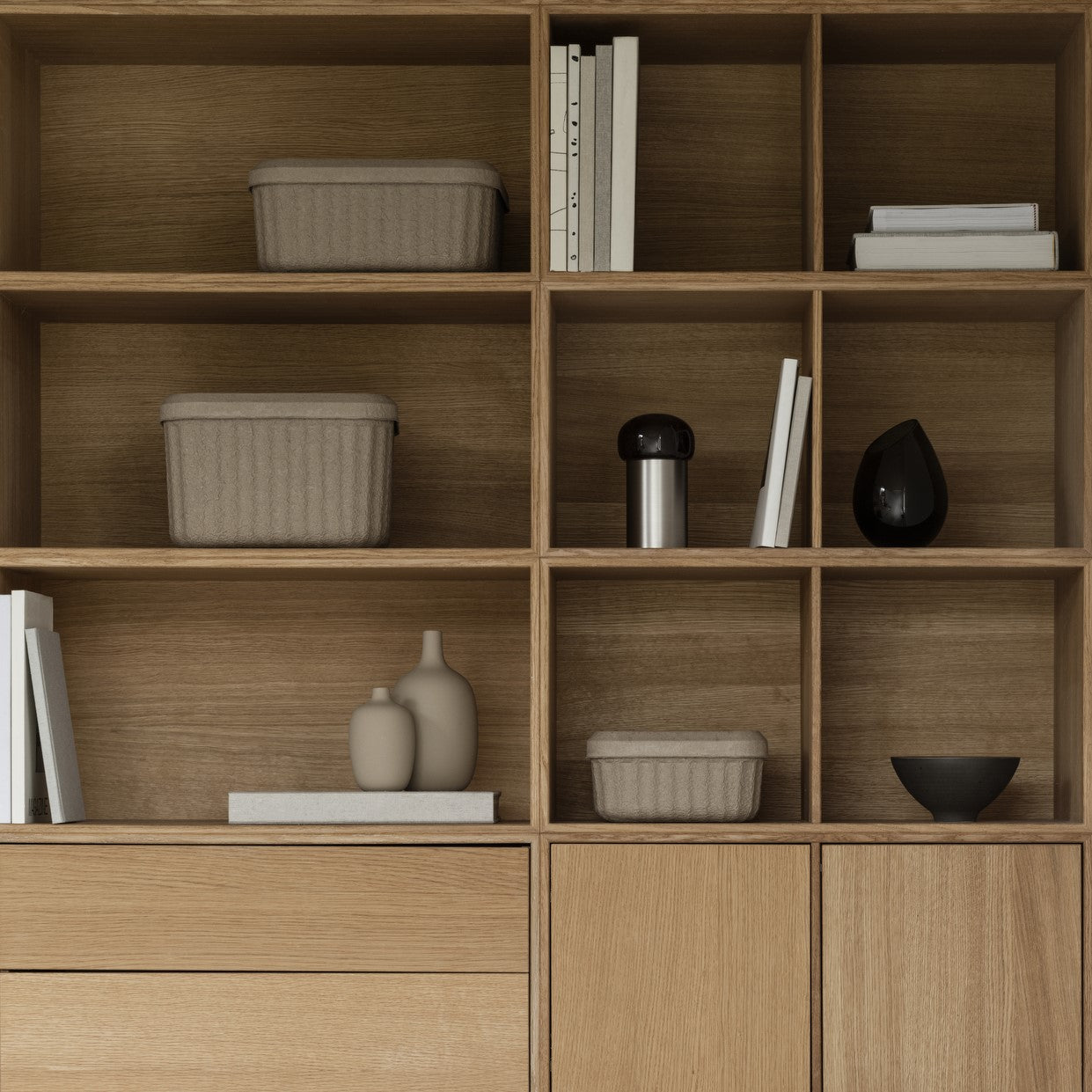 Modern wooden shelves with REDO recycled pulp storage baskets by blomus
