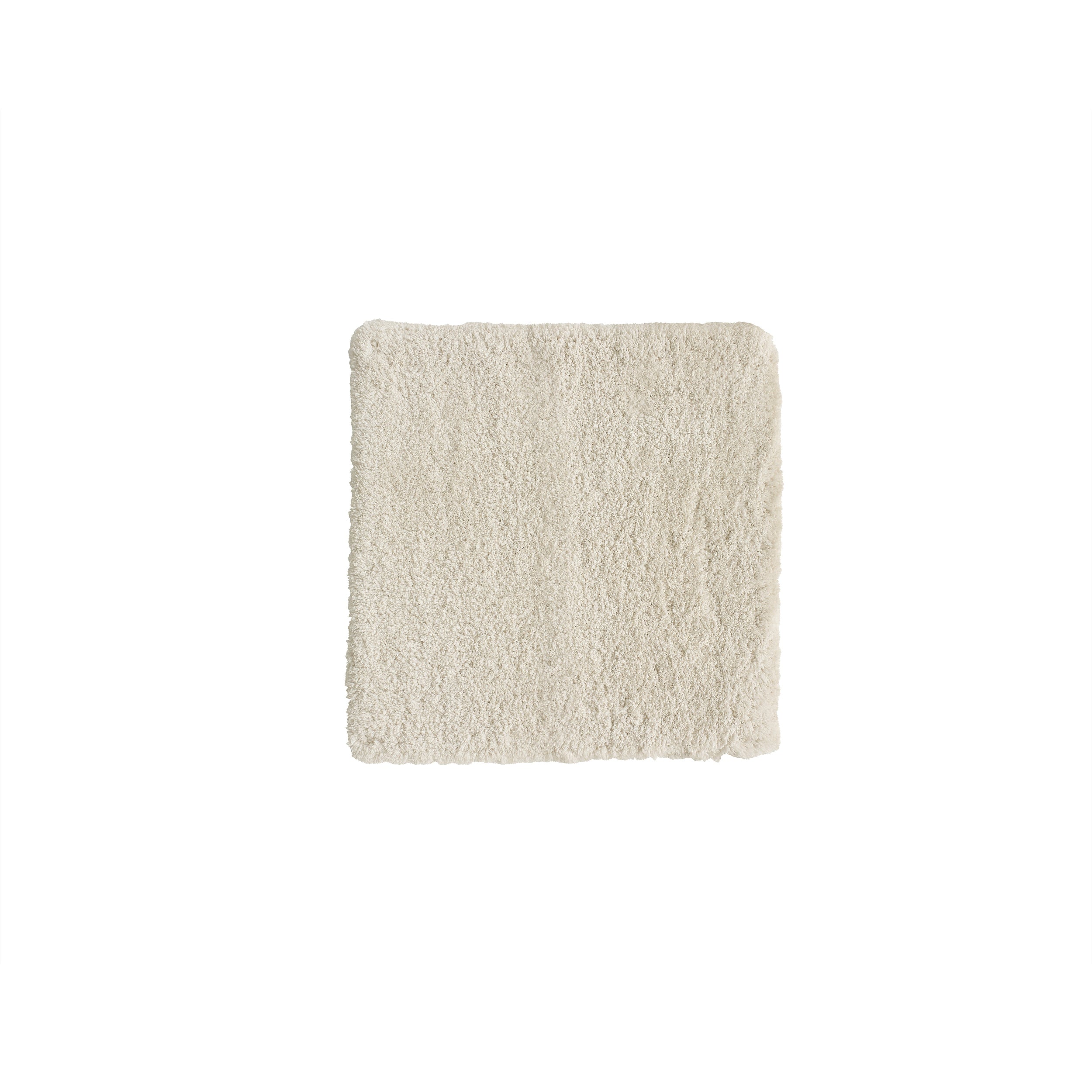 Beige bathmat square on a white background