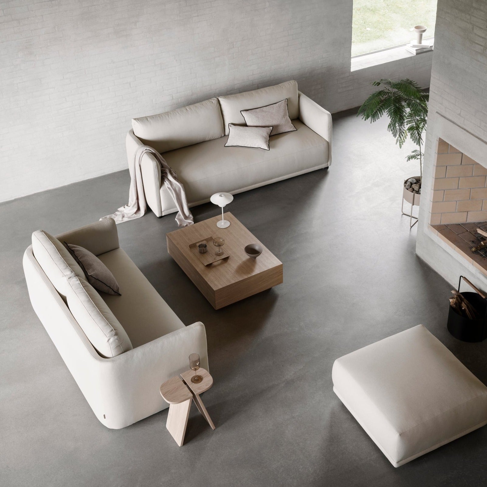 AVIO solid oak side table in a chic modern living space