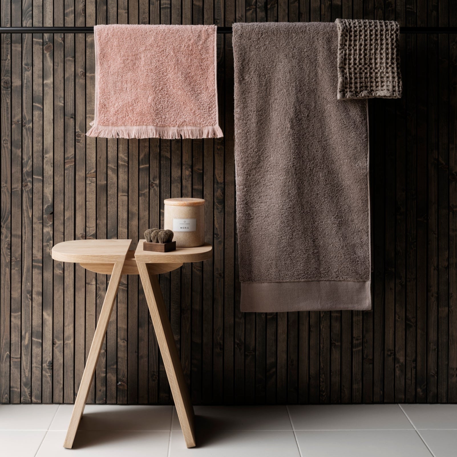 AVIO natural oak stool in a contemporary bathroom
