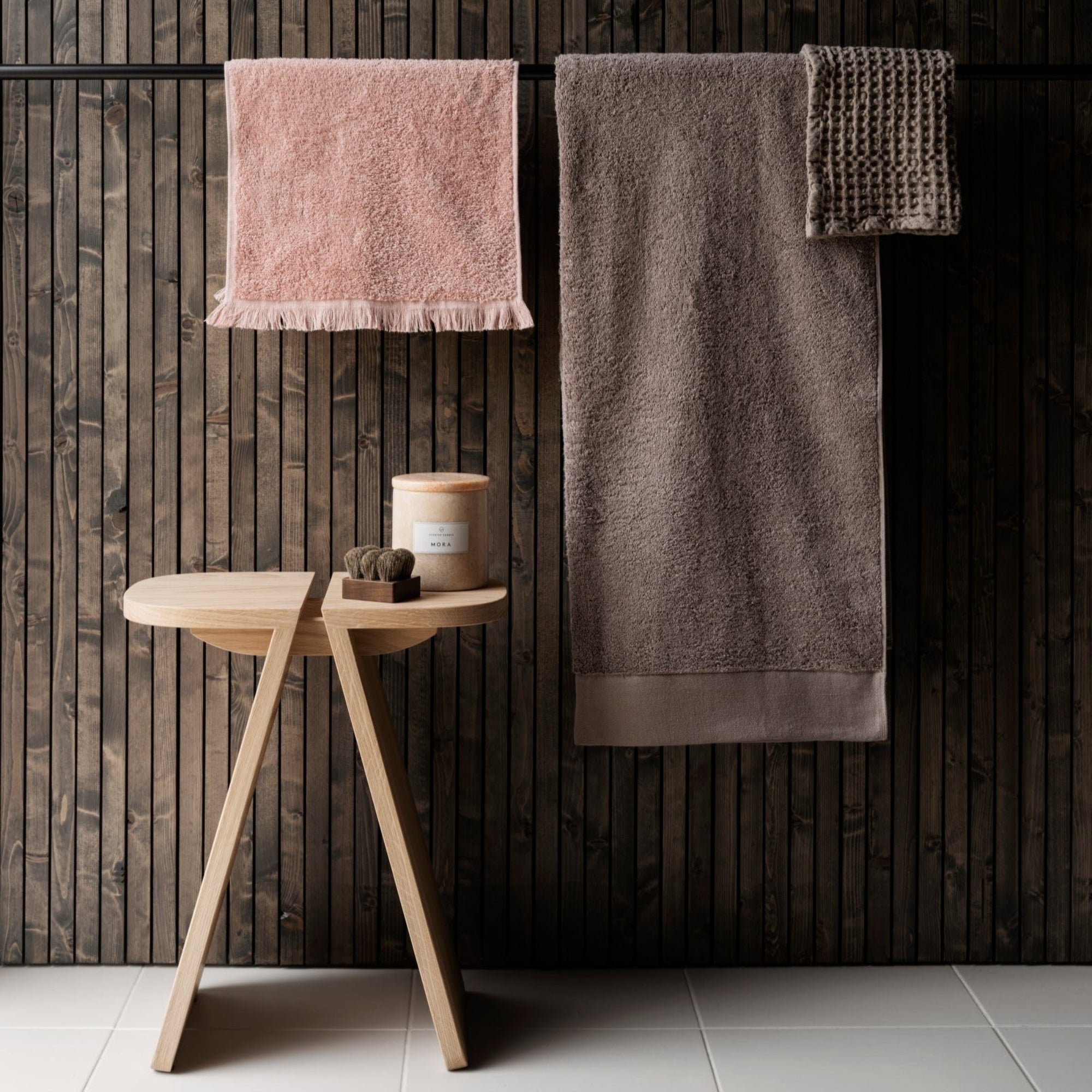 AVIO natural oak stool in a contemporary bathroom