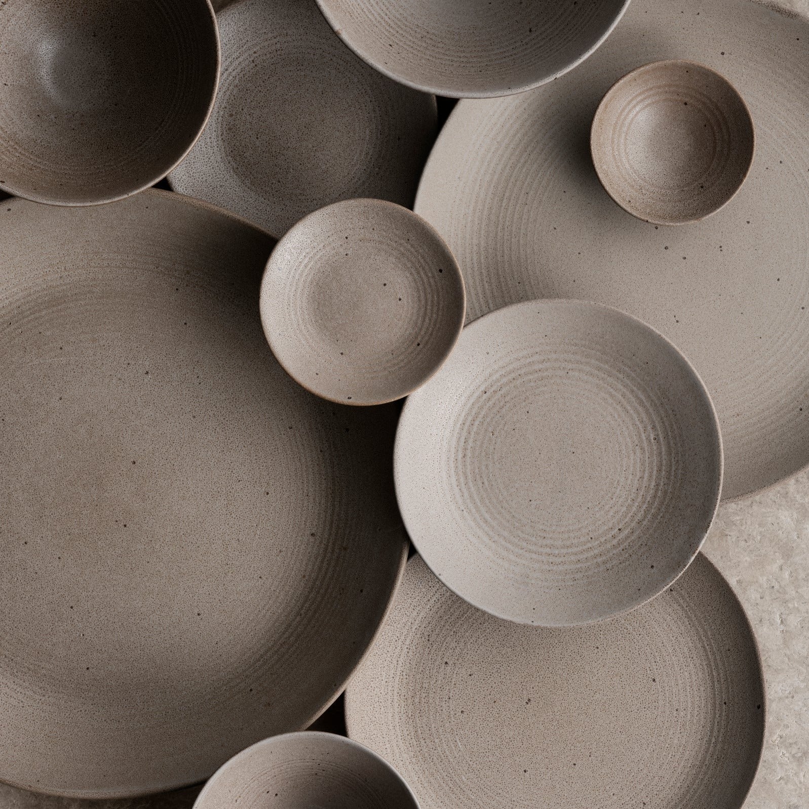 KUMI Stoneware plates and bowls in Fungi matte glaze  