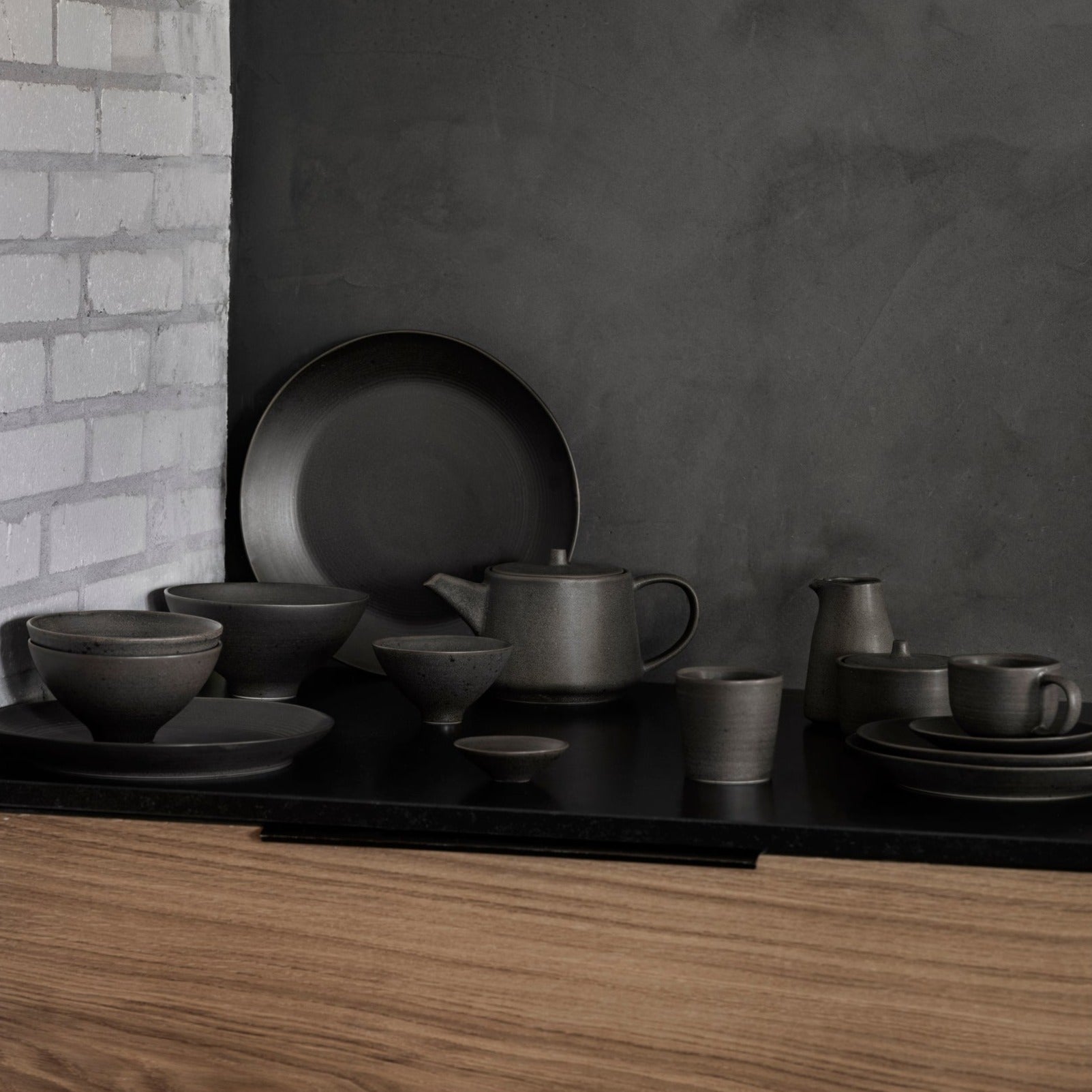 Blomus KUMI stoneware dinnerware set in Espresso brown, Japanese-inspired minimalist design