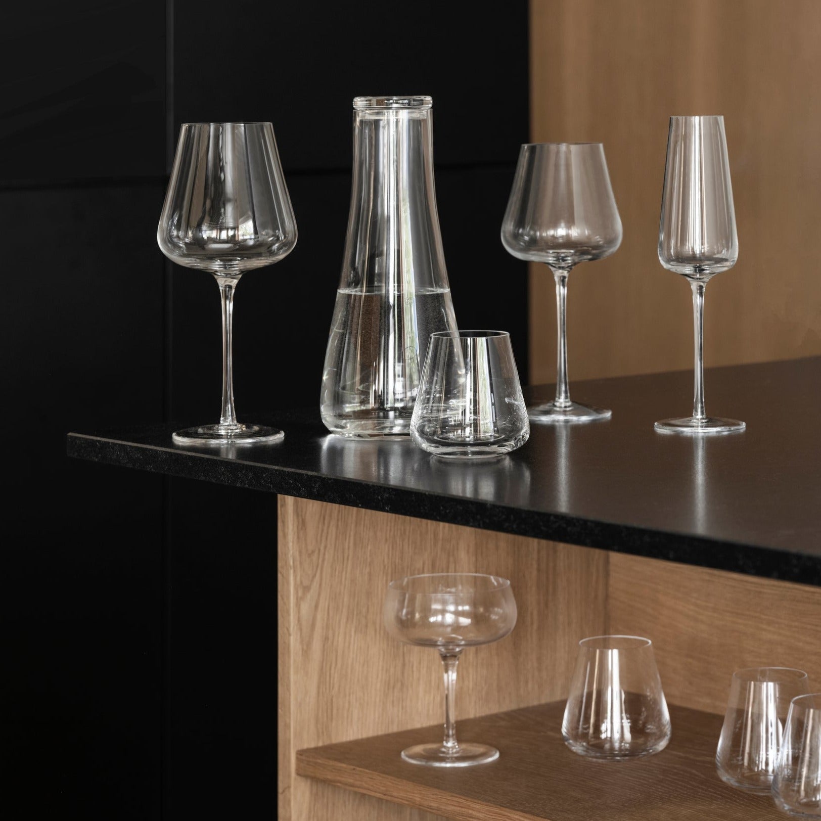 modern wine glasses from blomus BELO collection displayed on a black bar top