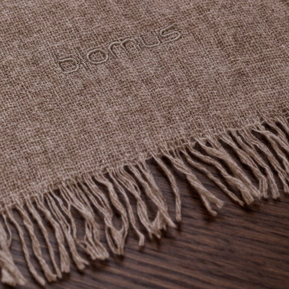 detailed stitching and blomus logo on MERINO throw