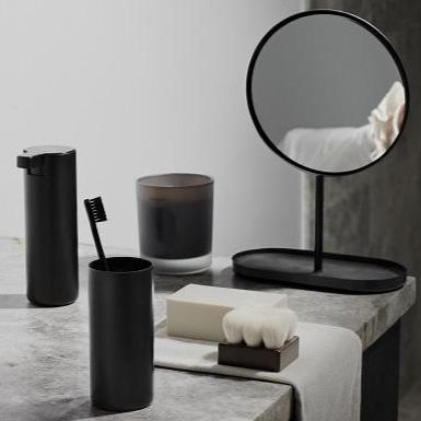 marble countertop displaying blomus MODO black titanium coated bathroom set