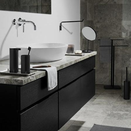 Modern bathroom setting with black stainless steel bathroom accessories from blomus MODO line