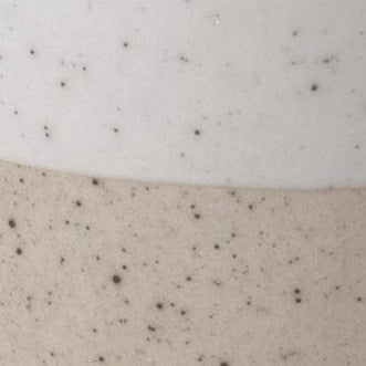 Detail view of blomus SABLO ceramic dinnerware with matte speckled finish