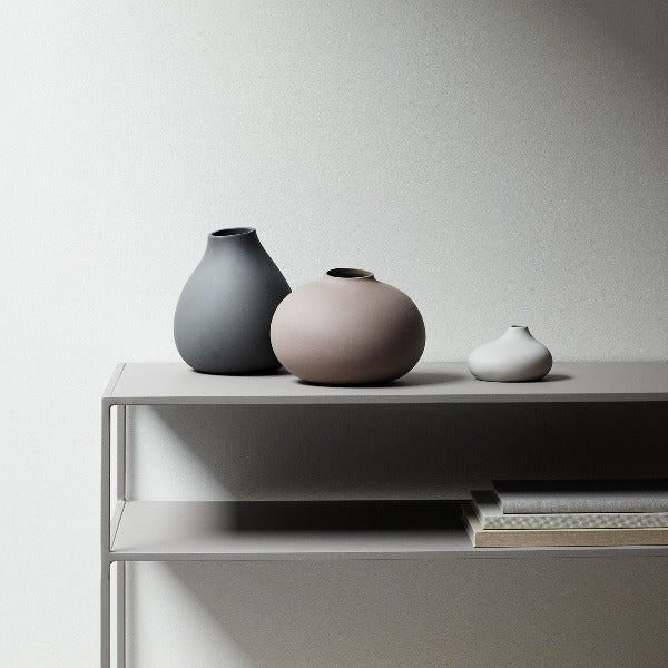 NONA porcelain vases with matte finish displayed on a simple table